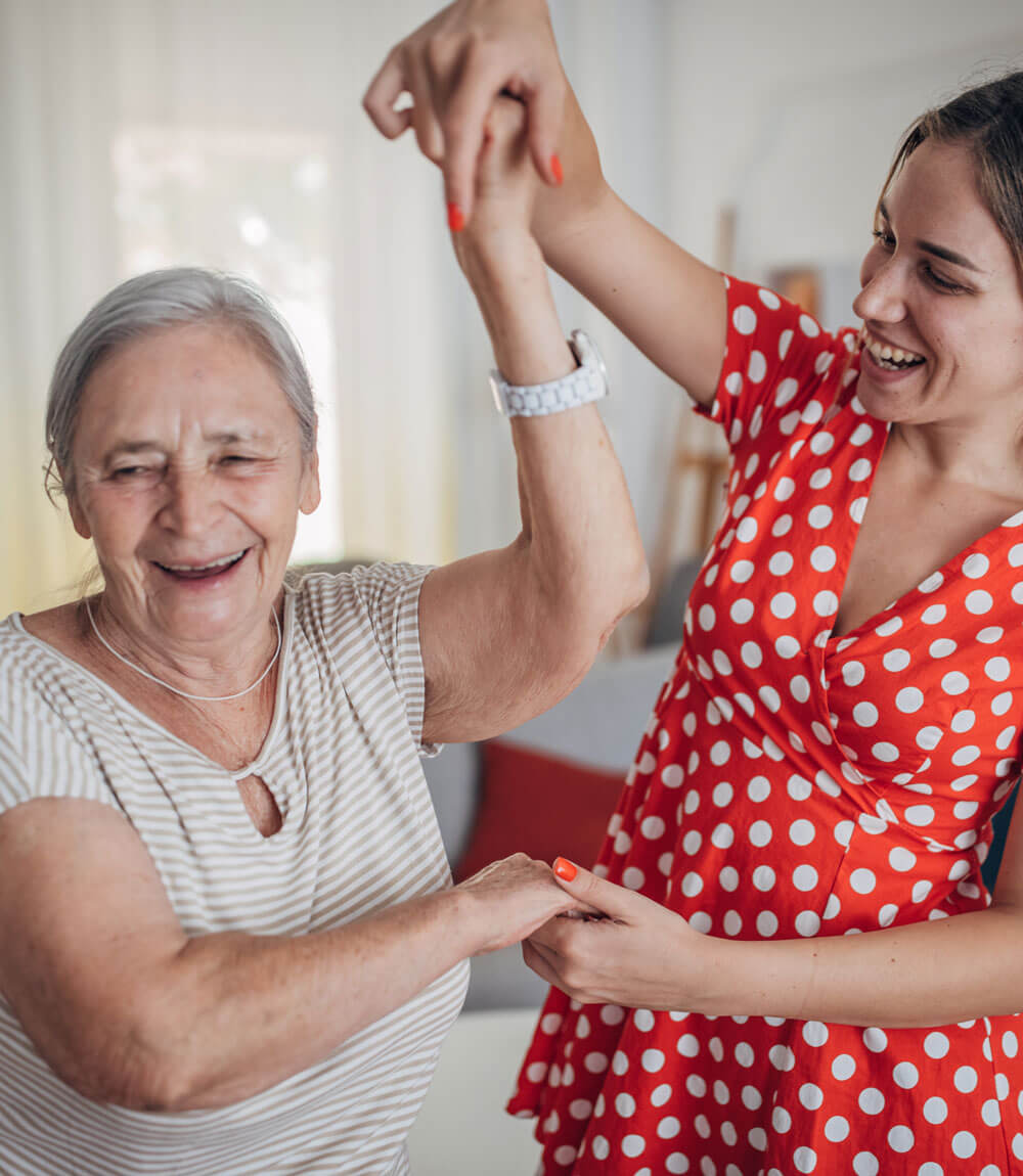 older adult with adult daughter